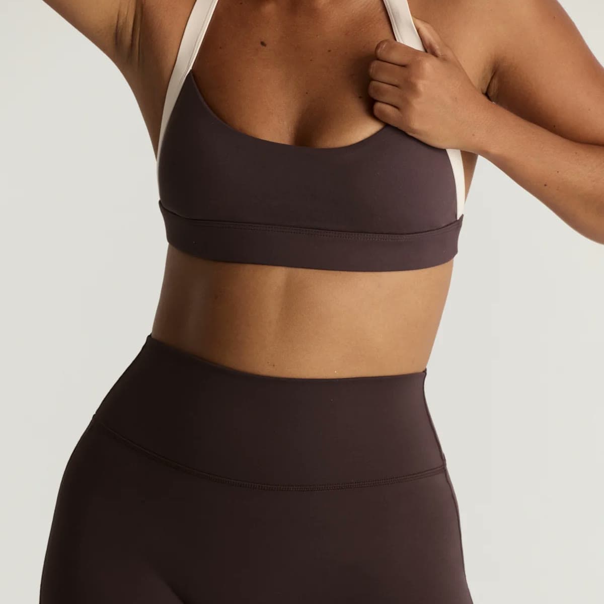 CSB espresso halter sports bra with contrast cream straps and matching leggings